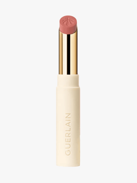 Guerlain Kiss Kiss Honey-Infused Refillable Lipstick in branded component on a light gray background