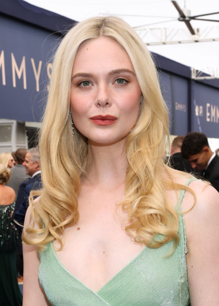 Elle Fanning wearing a green gown